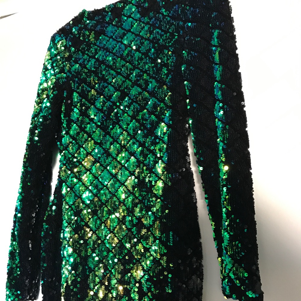 Emerald and gold sequined long sleeved mini dress.